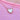 A close-up of a heart-shaped pendant necklace with a white mother-of-pearl center and a gold crystal border